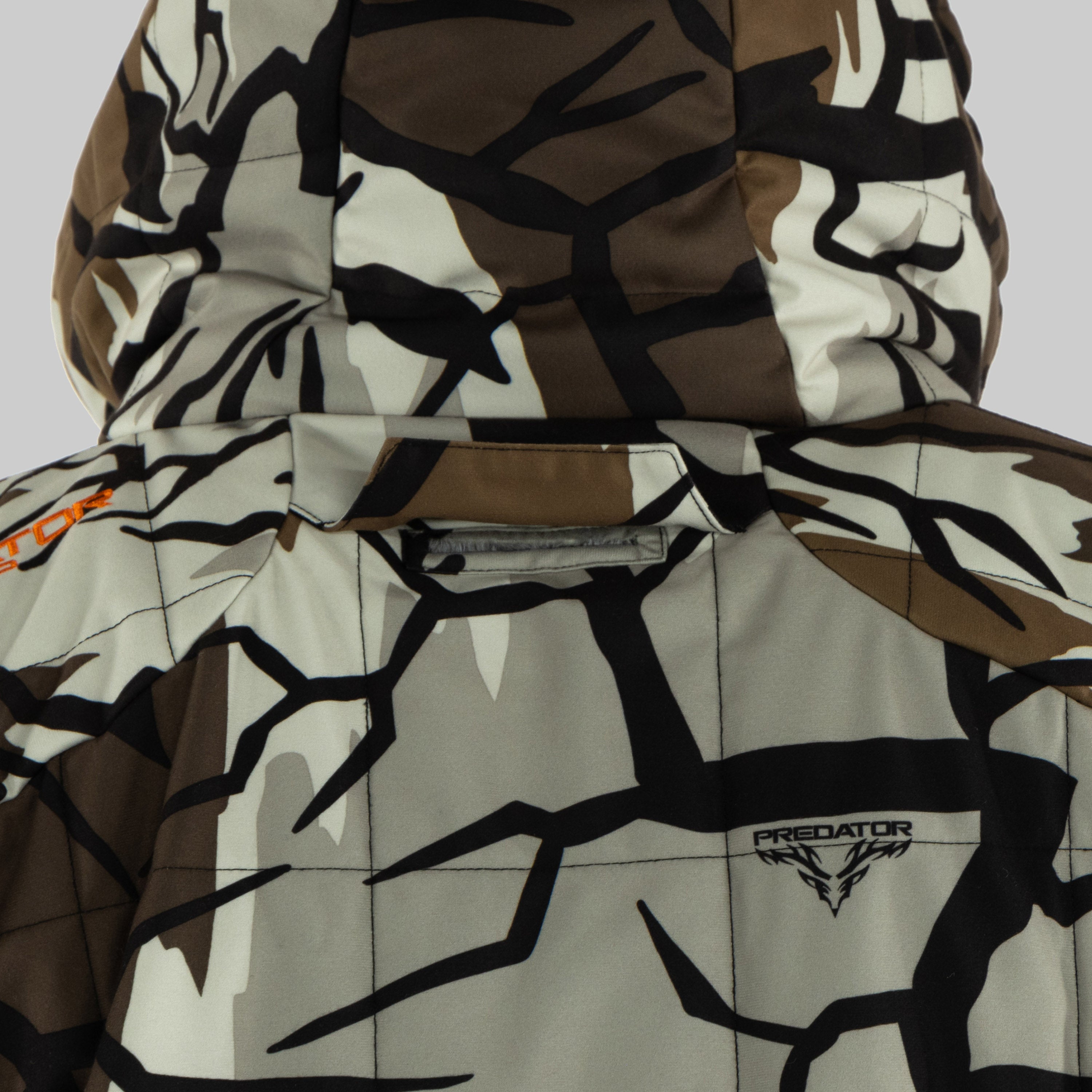 Ambush Insulated Jacket safety harness slot. 